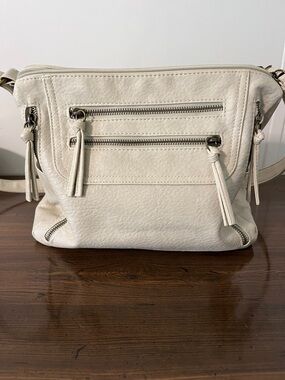 Bueno Cream Crossbody Bag with Front Zip Tassels